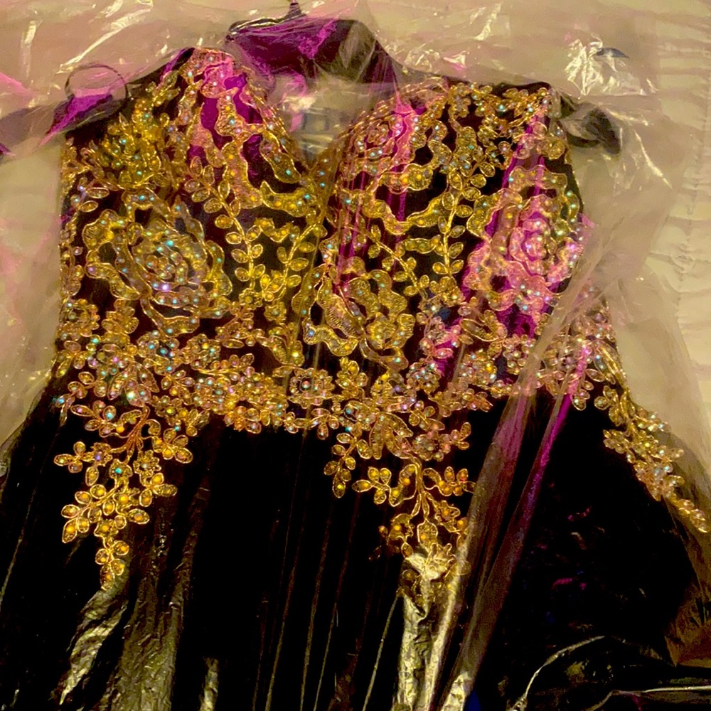 Was used as a 15s dress only worn once